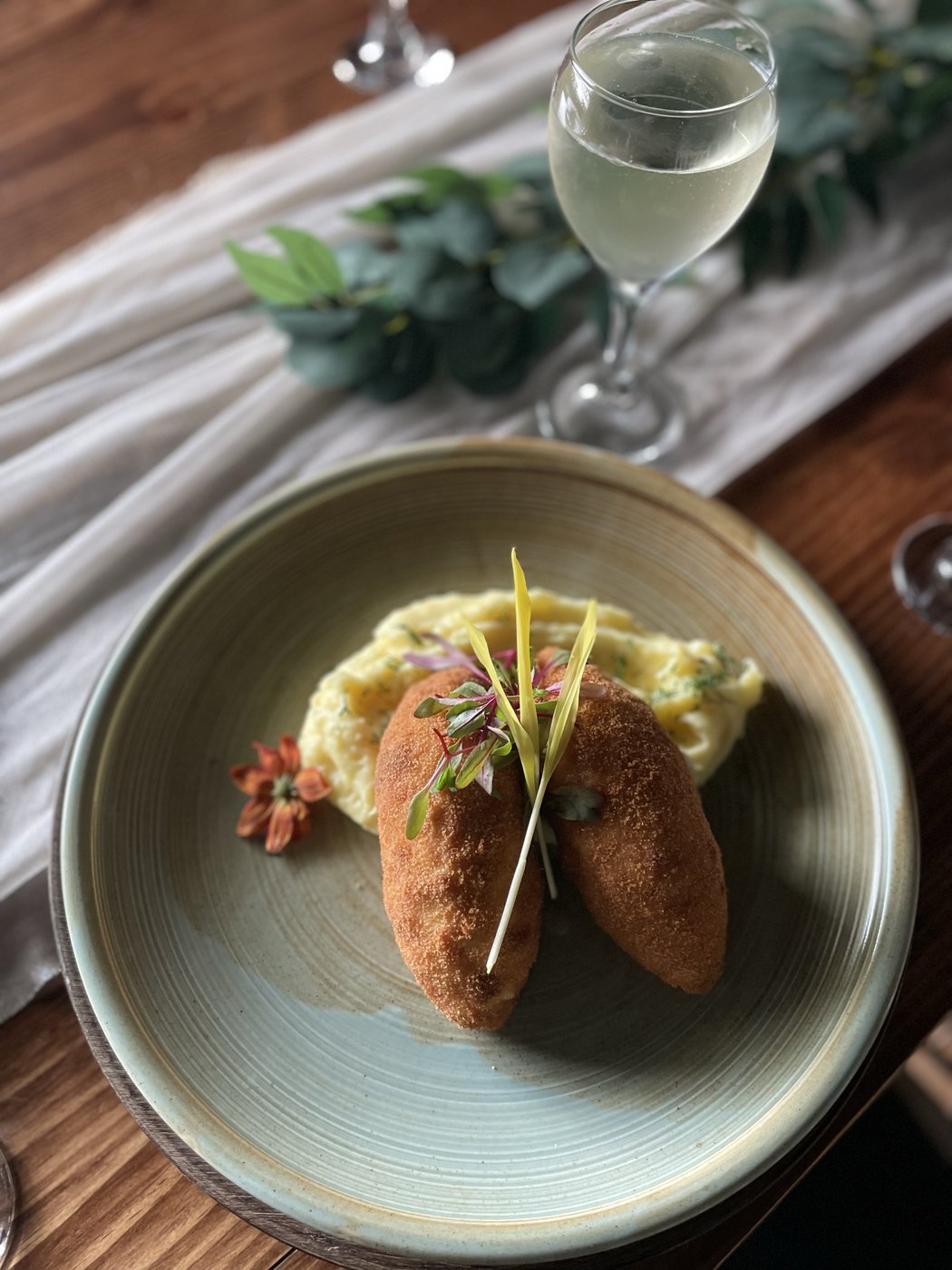 Chicken Kiev with mashed potatoes, butter and dill